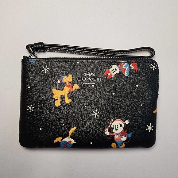 NWT Coach CN031 Disney Corner Zip Wristlet Holiday Minnie Mickey Daffy Pluto - Picture 1 of 3